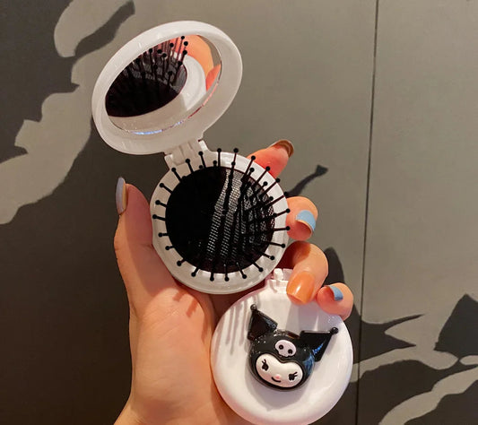 Petite brosse à cheveux